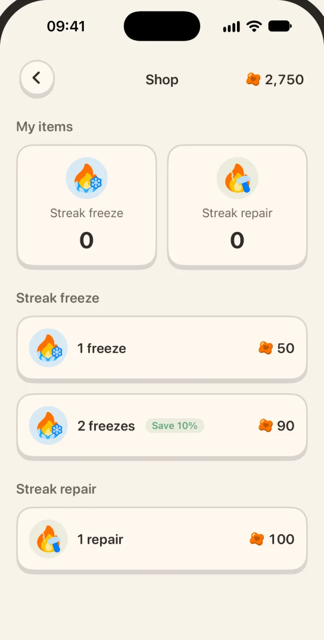 Fupori's shop, where coins buy streak freezes and streak repairs.